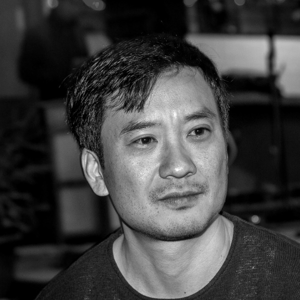 A black and white picture of Dr Arkotong Longkumer