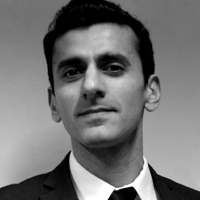 A black and white picture of Professor Nasar Meer