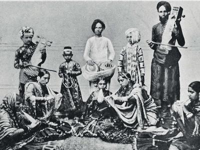 Postcard printed by Gobind Ram and Oodey Ram, Jaipur, c 1900 A troupe of Indian show people.