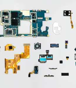 Re-materialising the Digital: a deconstructed iPhone in pieces neatly laid out